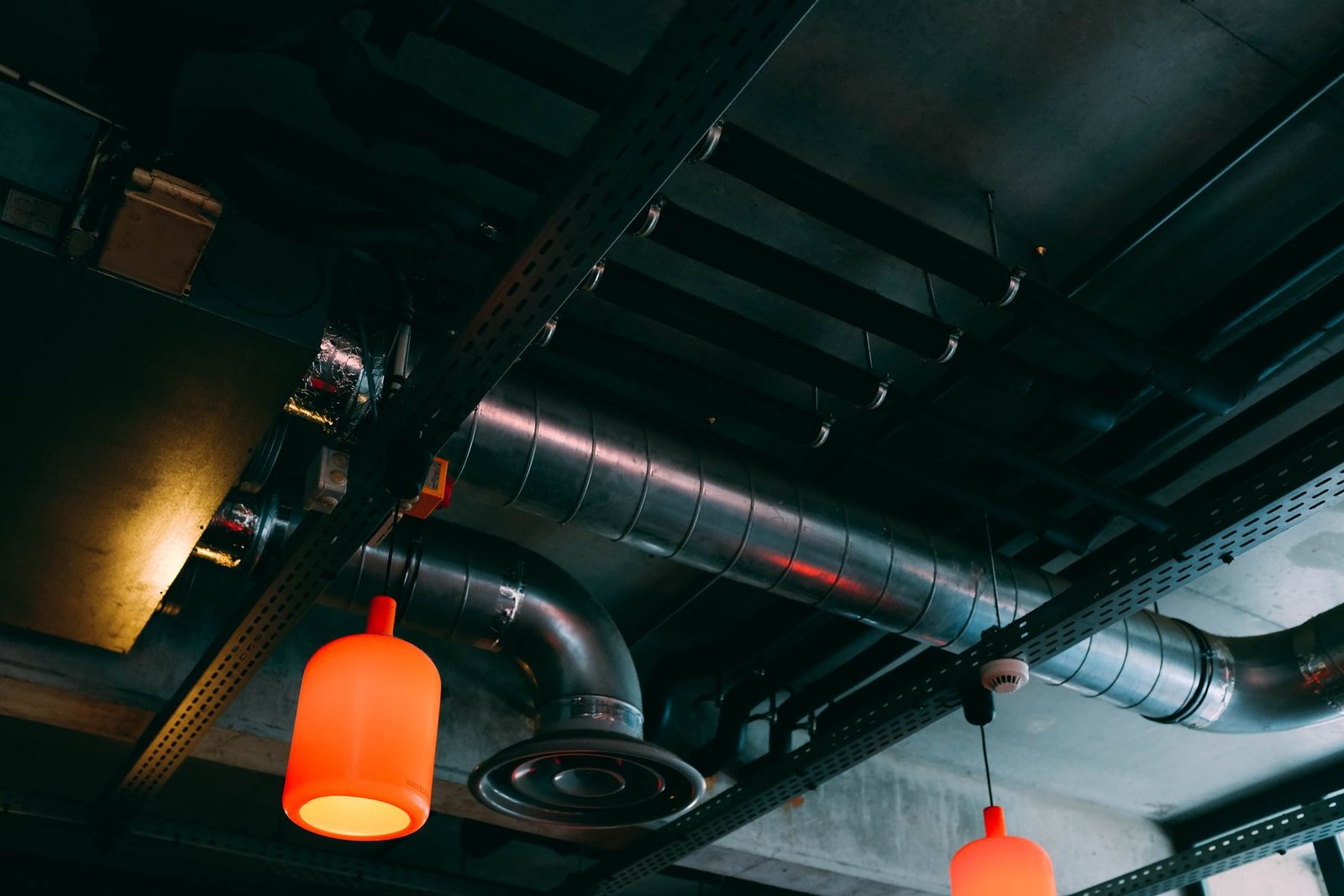Ceiling-level ventilation ducts in an indoor space